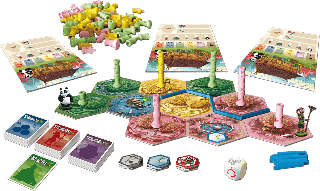 Speelstukken van Takenoko uitgespreid op tafel