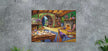 Charmed Cottage - Puzzel 1000 stukjes - Ravensburger 12001849, afgewerkte puzzel aan de wand