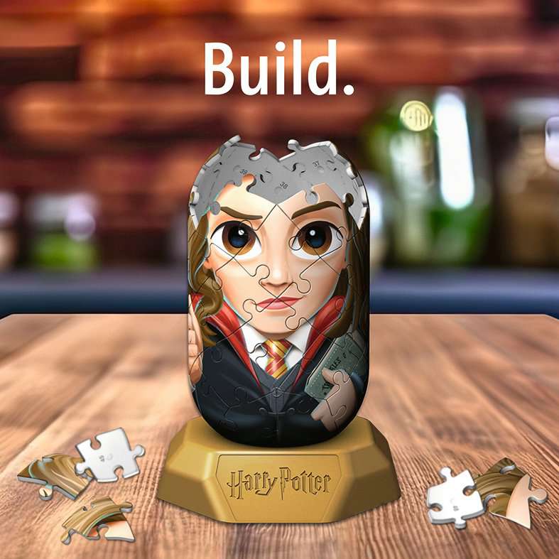 Hermione Granger 3D puzzel half opgebouwd op houten tafel – Hylkies Ravensburger