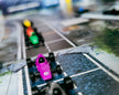 Close-up van racewagens op het speelbord van Heat Tunnel Vision