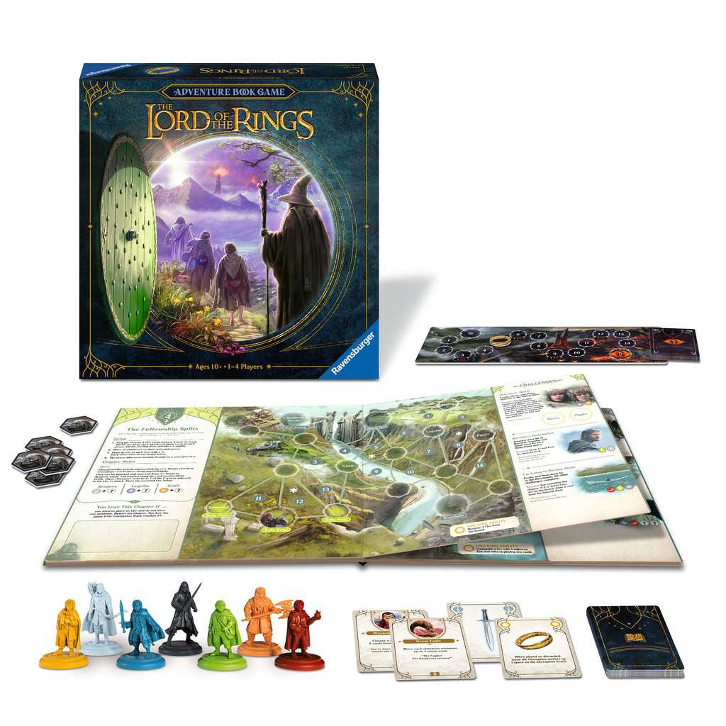 Spelonderdelen en open boek naast de doos van Lord of the Rings Adventure Book Game