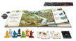 Spelonderdelen en open spelboek van Lord of the Rings Adventure Book Game