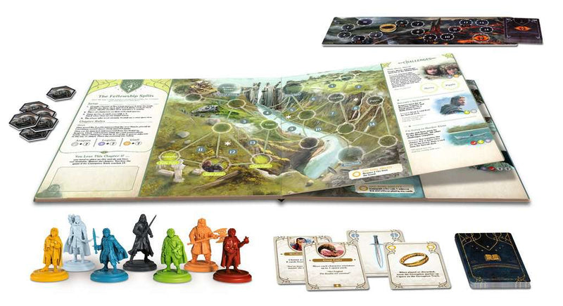 Spelonderdelen en open spelboek van Lord of the Rings Adventure Book Game