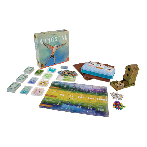 Spelmateriaal van Wingspan met gesloten doos op de achtergrond