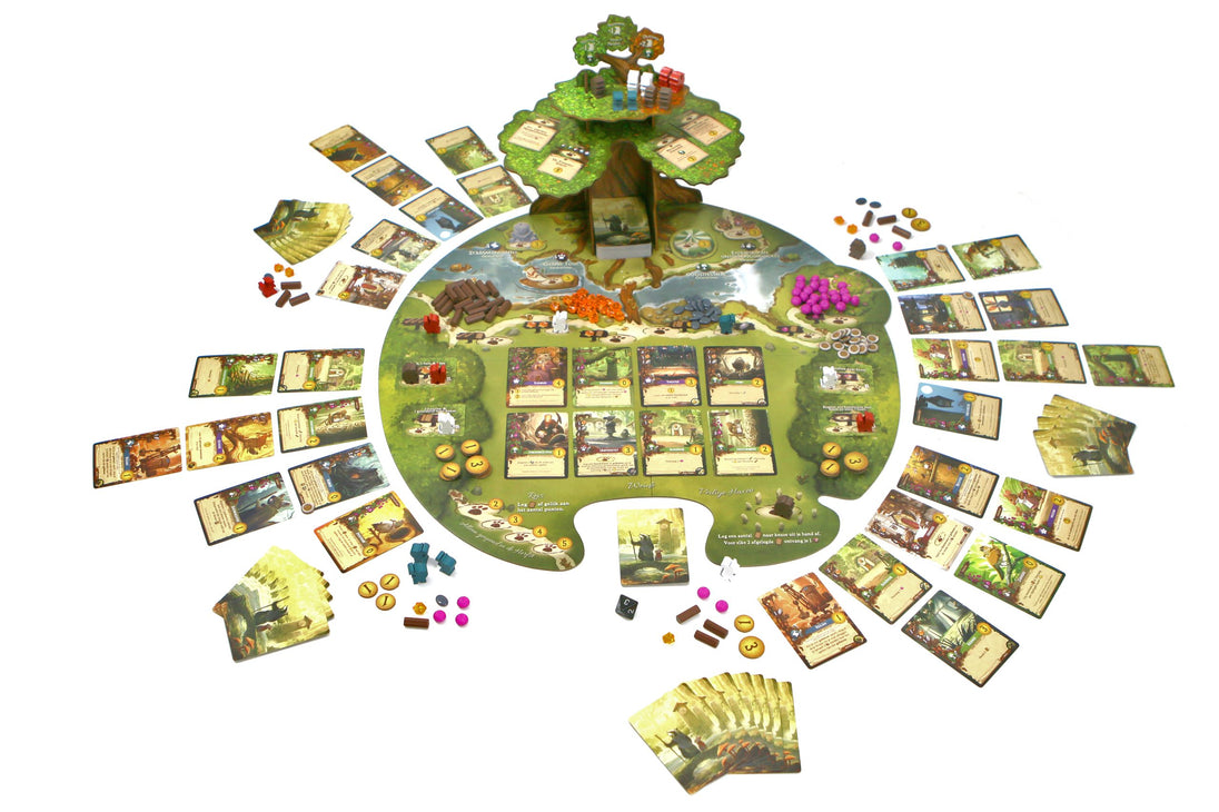 Speelstukken van Everdell uitgespreid met doos op de achtergrond